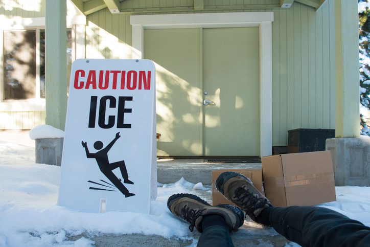 Stephen C. Carter, PC Attorney at Law | Hartwell, GA | delivery person with boxes has slipped in icy conditions